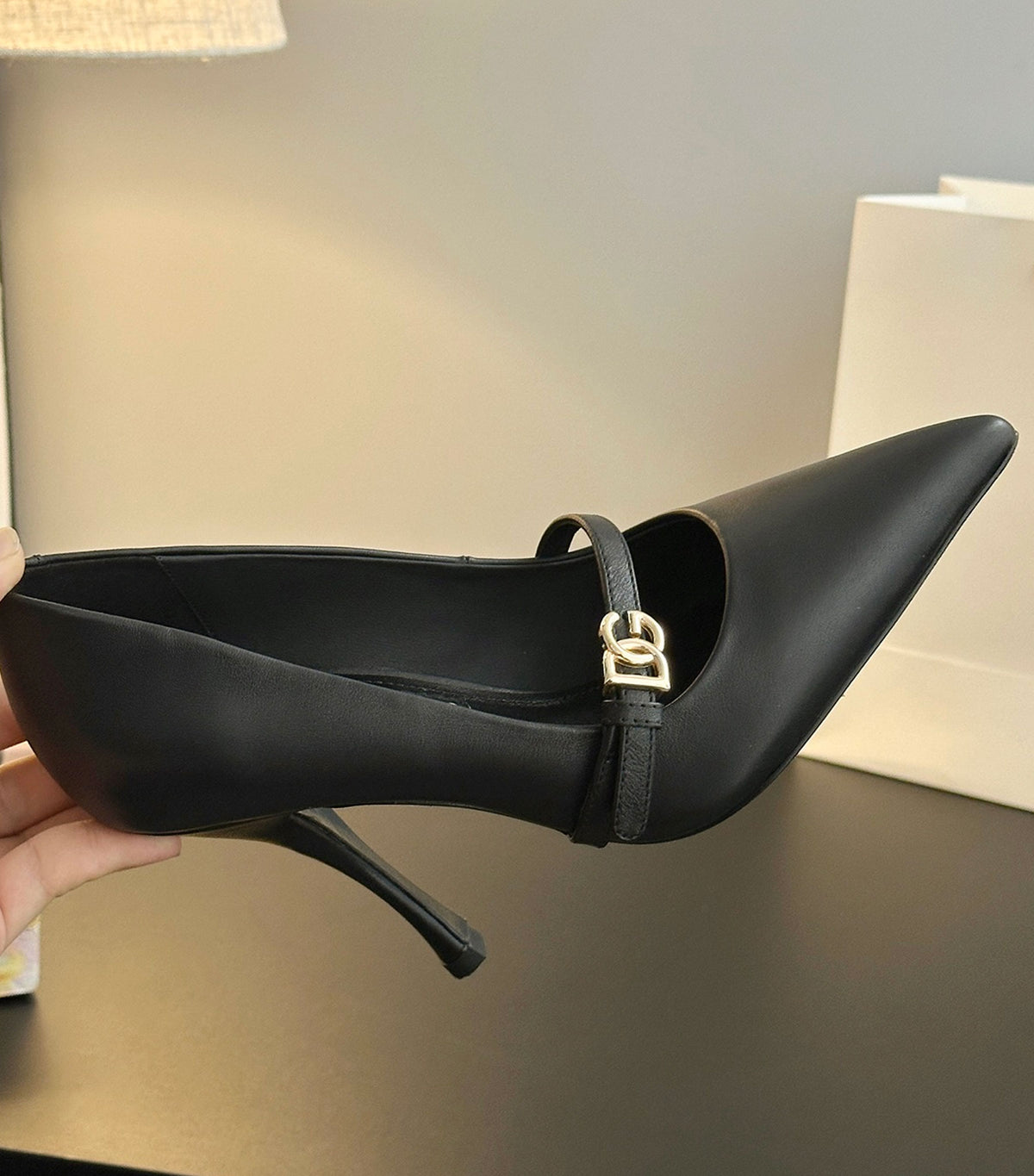 Leather pointed-toe pumps