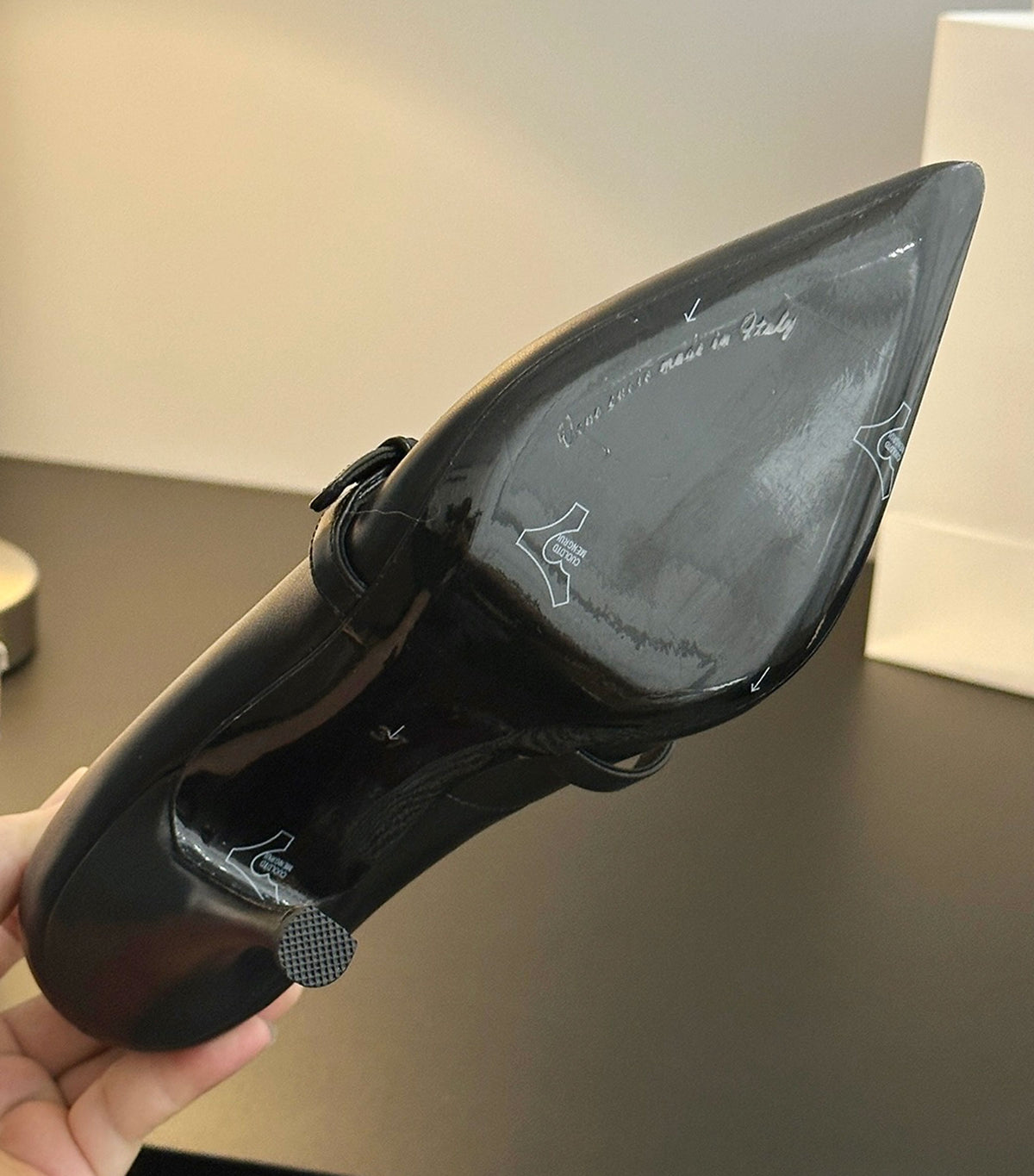 Leather pointed-toe pumps