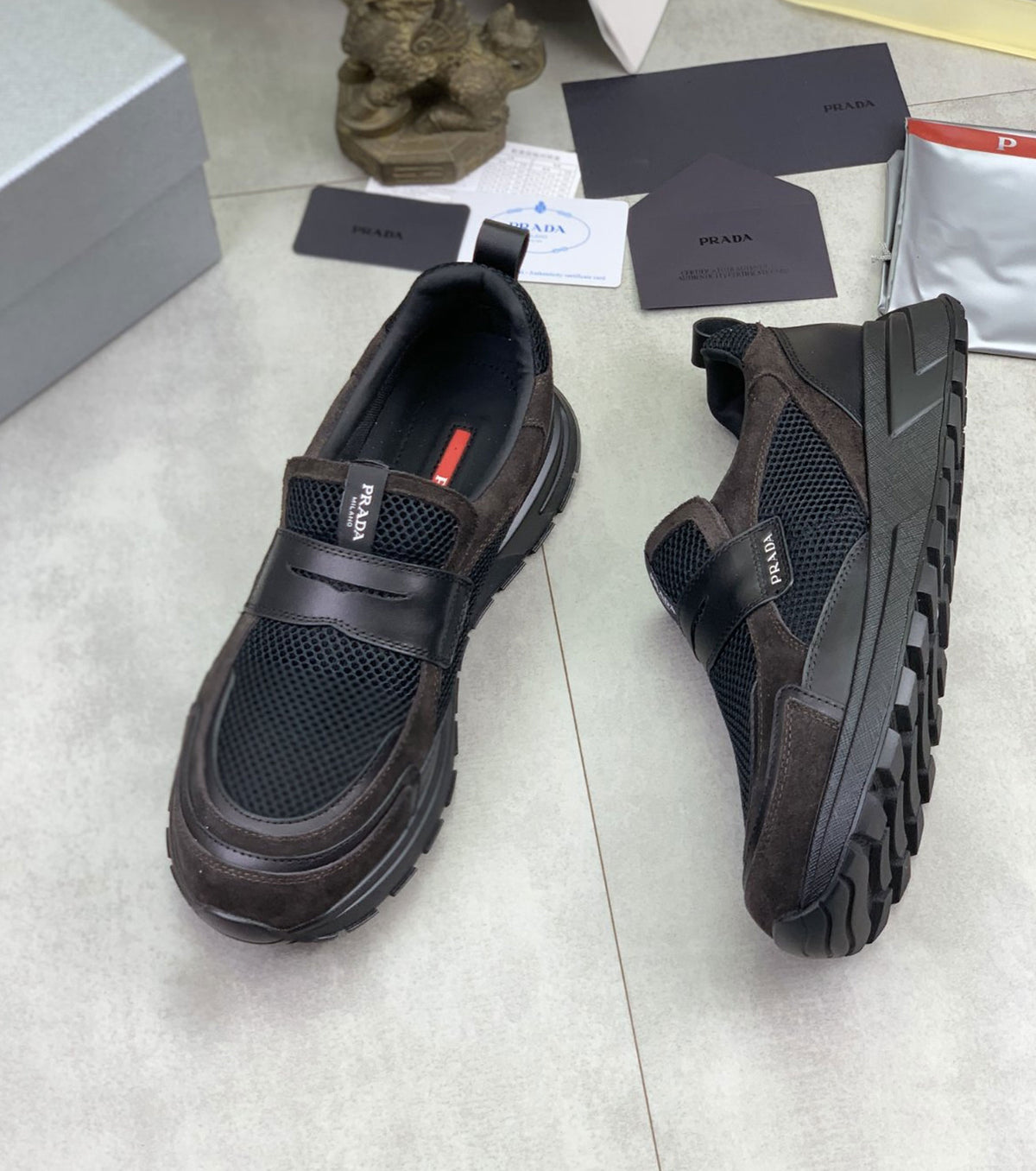 Leather and mesh fabric loafers