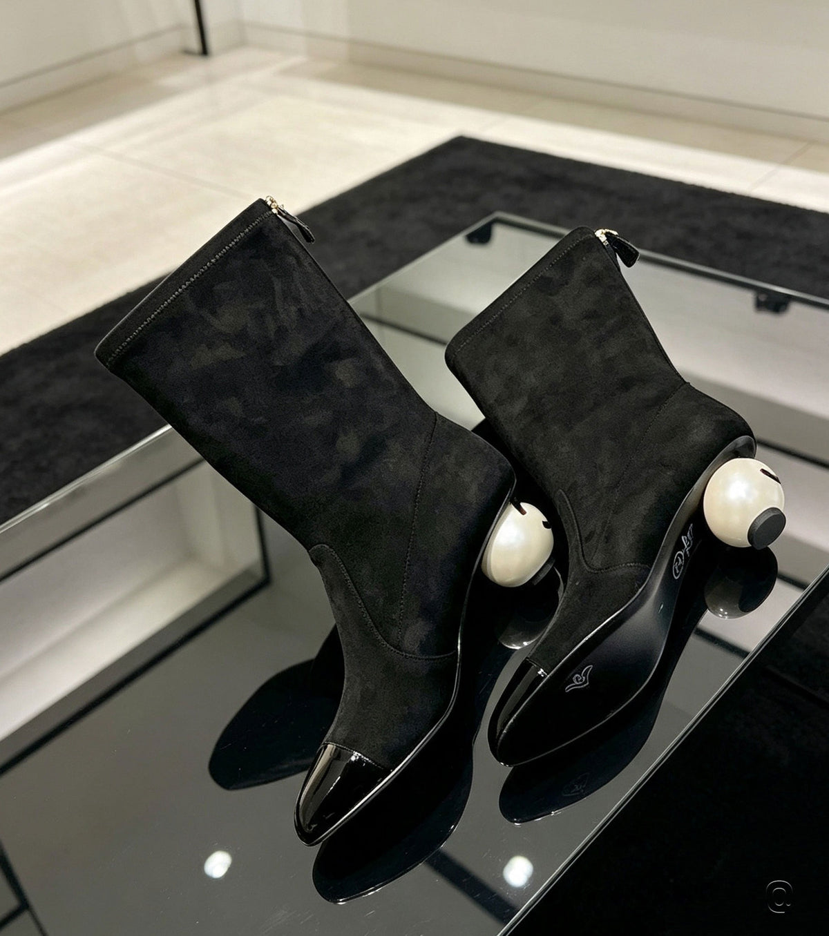 Mid-calf boots with pearl heel