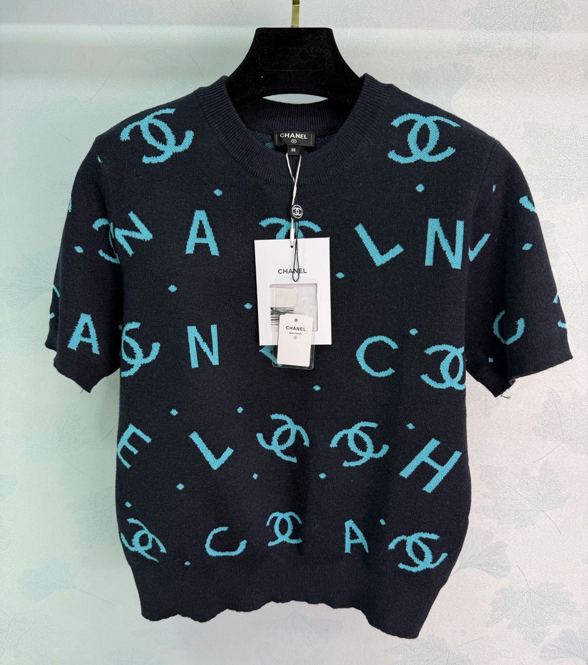 Дамски пуловер с къс ръкав