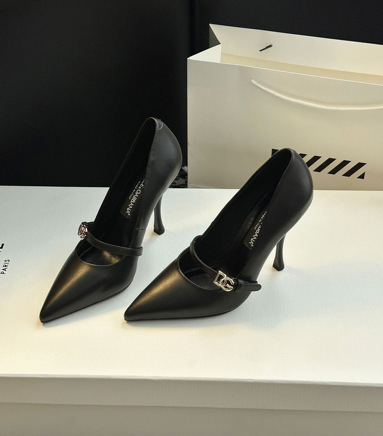 Leather pointed-toe pumps
