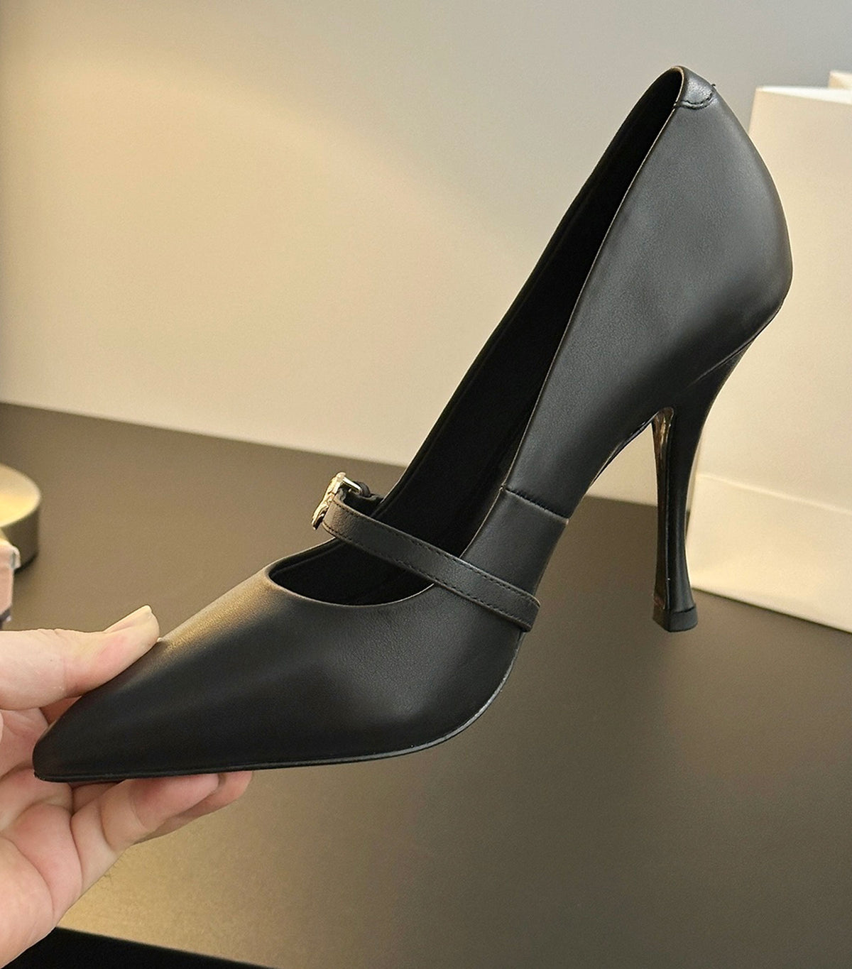 Leather pointed-toe pumps