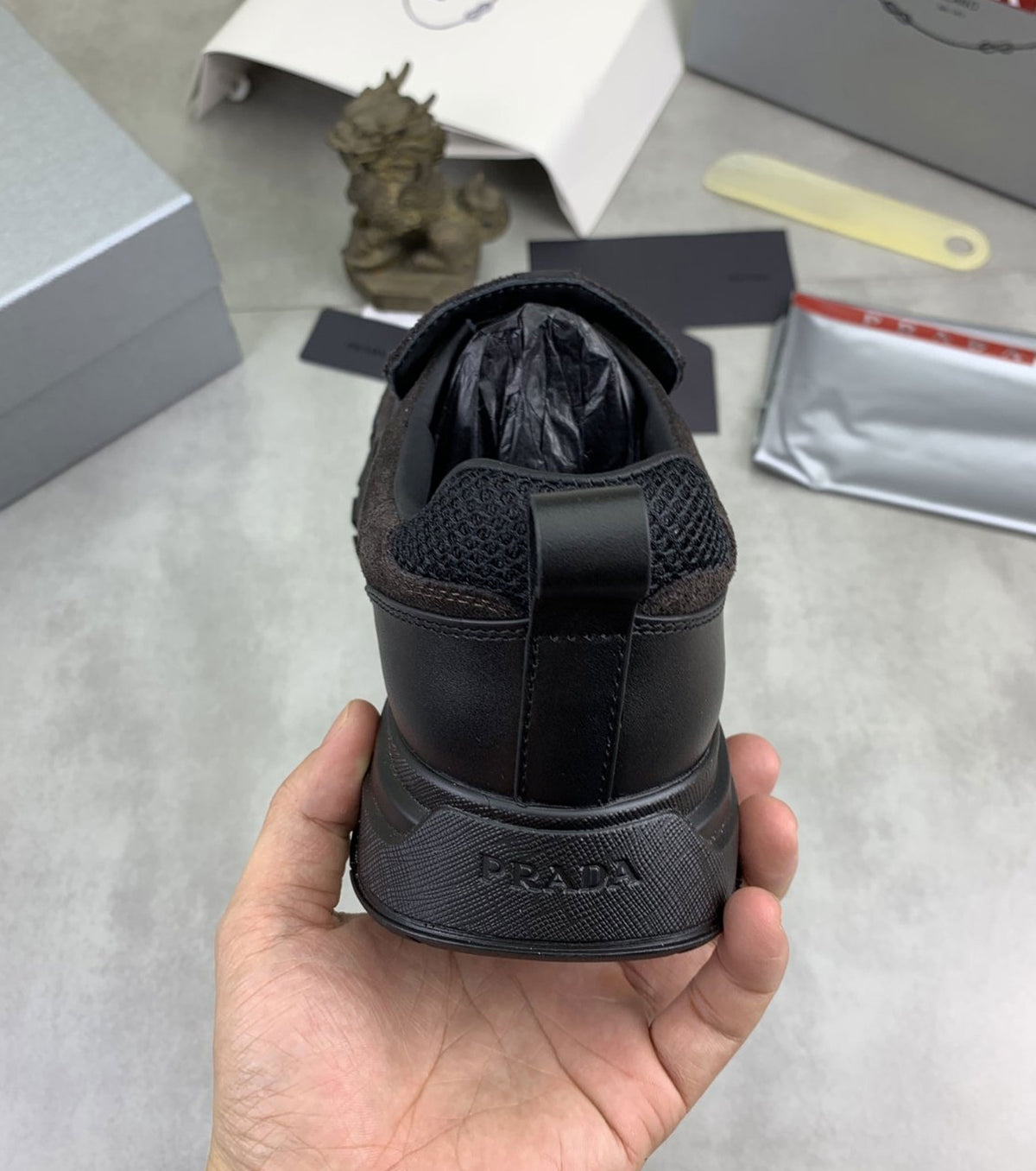 Leather and mesh fabric loafers