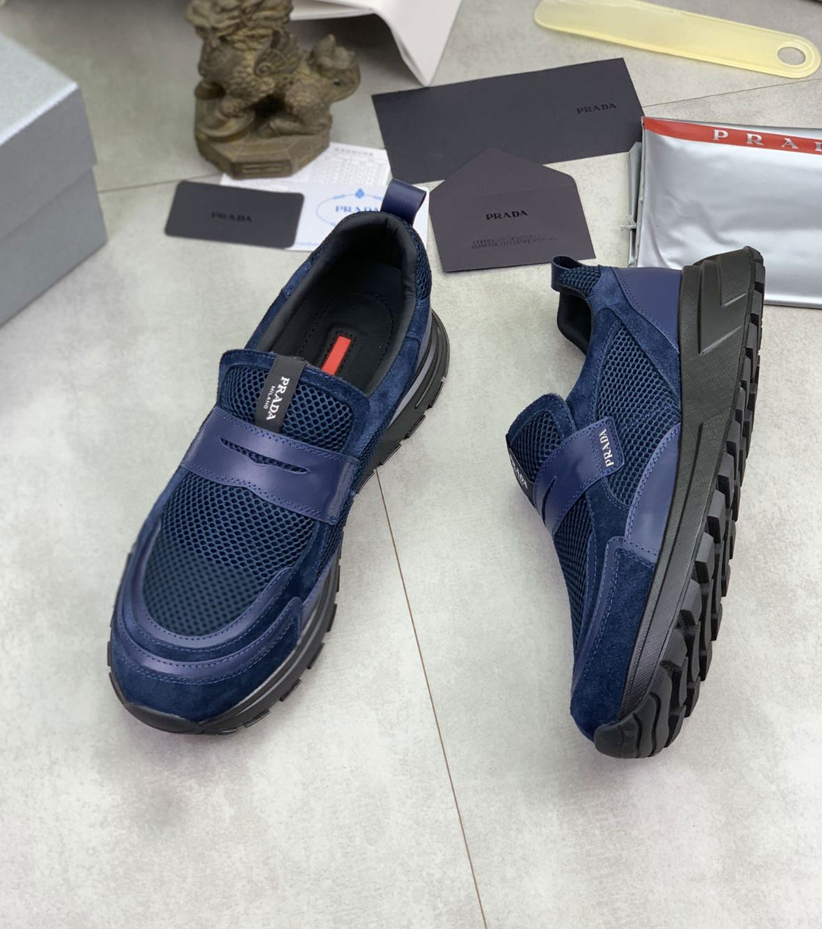Leather and mesh fabric loafers