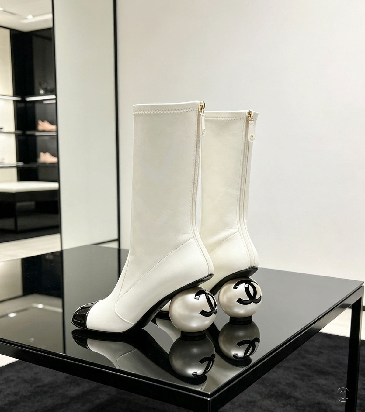 Mid-calf boots with pearl heel