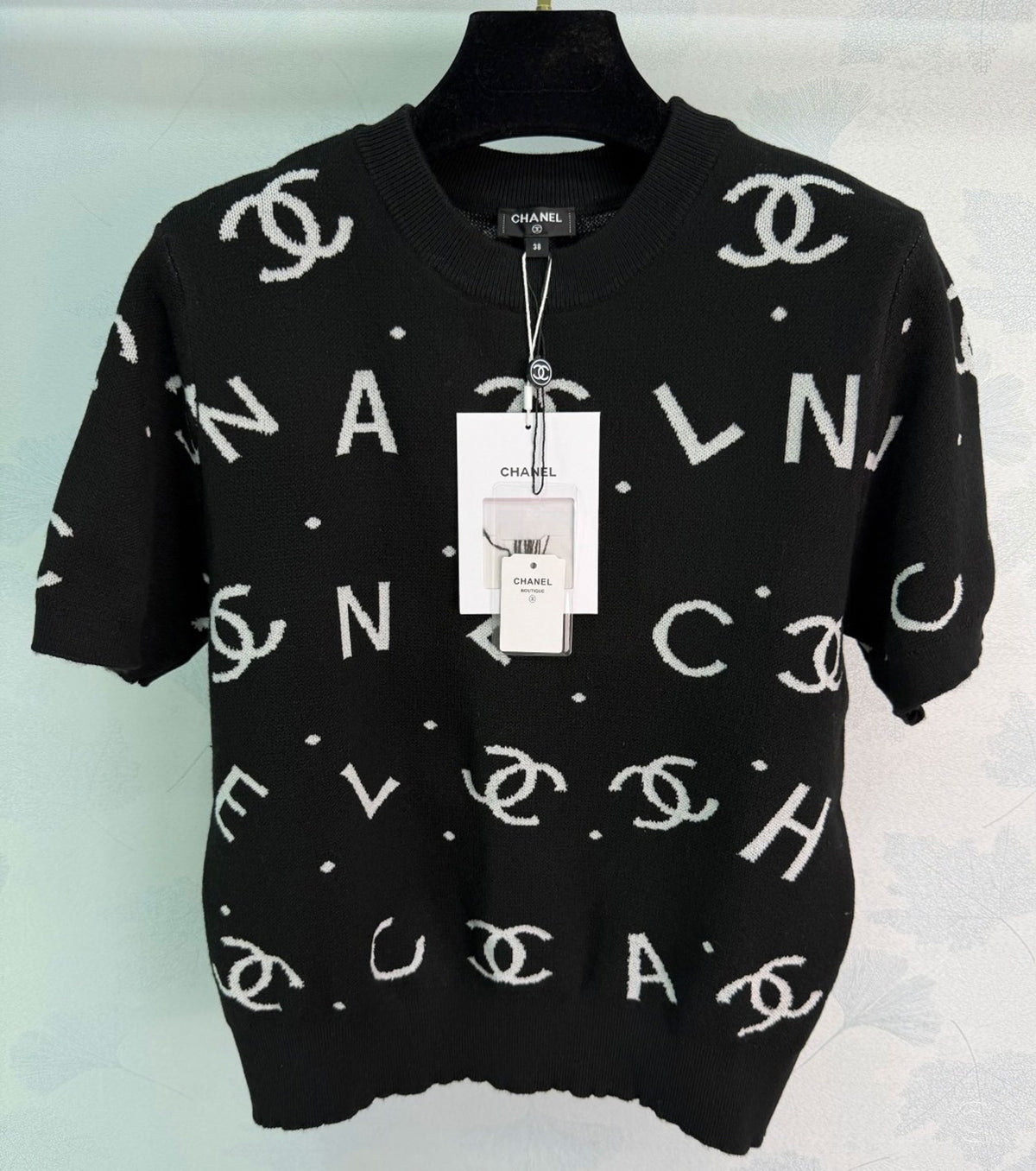 Дамски пуловер с къс ръкав